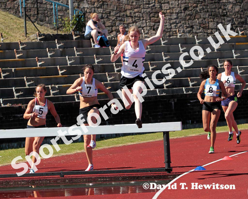 Lauren Stoddard (Edinburgh AC) on her way to winning the 2000 metres steeplechase in a League Record at the UK Women's National League, Premier, Meadowbank, Edinburgh.